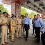 The Police Commissioner and the State Police Chief inspected the growing traffic problem on the city’s SG Highway.